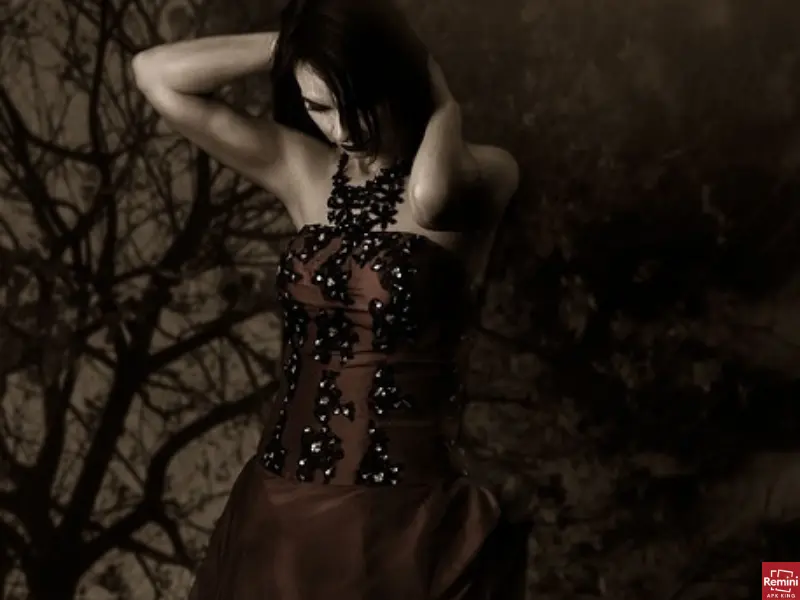 How To Take Dark & Moody Photos 9 Girl posing in dark photography
