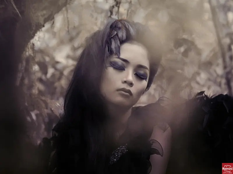 How To Take Dark & Moody Photos 18 Girl face in dark and moody photography