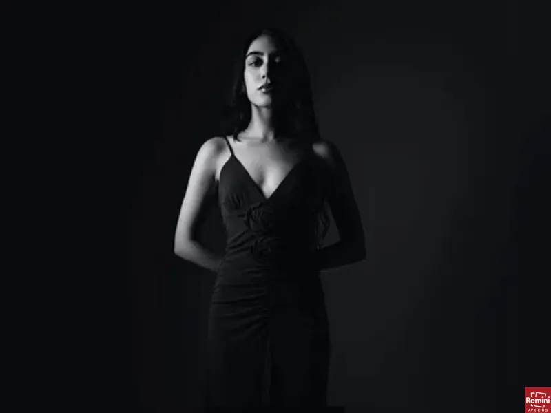 How To Take Dark & Moody Photos 16 Girl standing in dark photography