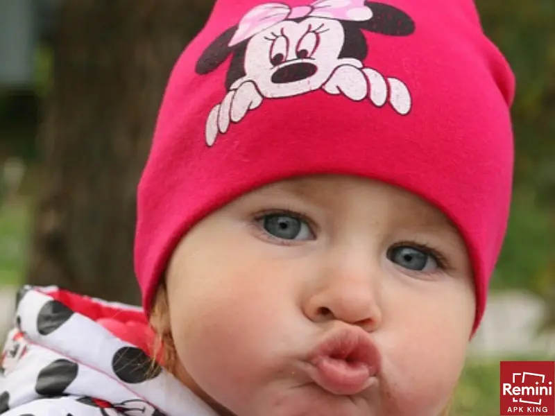 Photographing Your Baby's Milestones – A First Year Photoshoot 14 baby with red cap